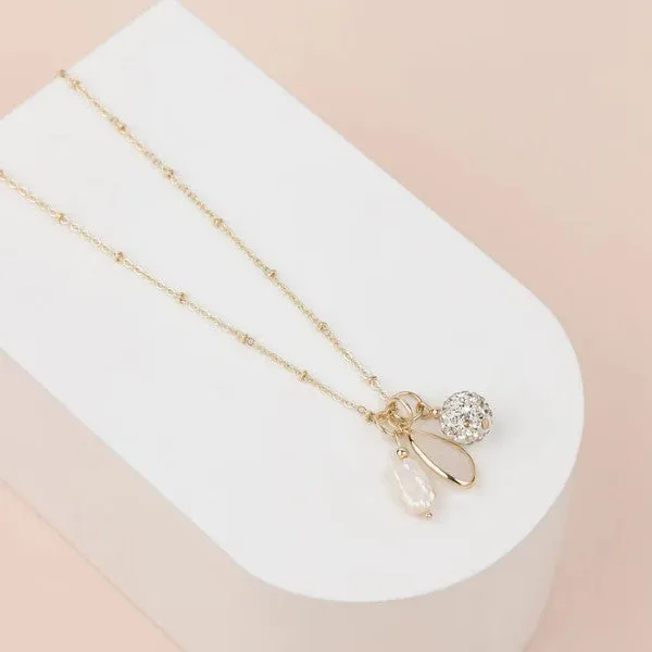 LONG CHARM NECKLACE