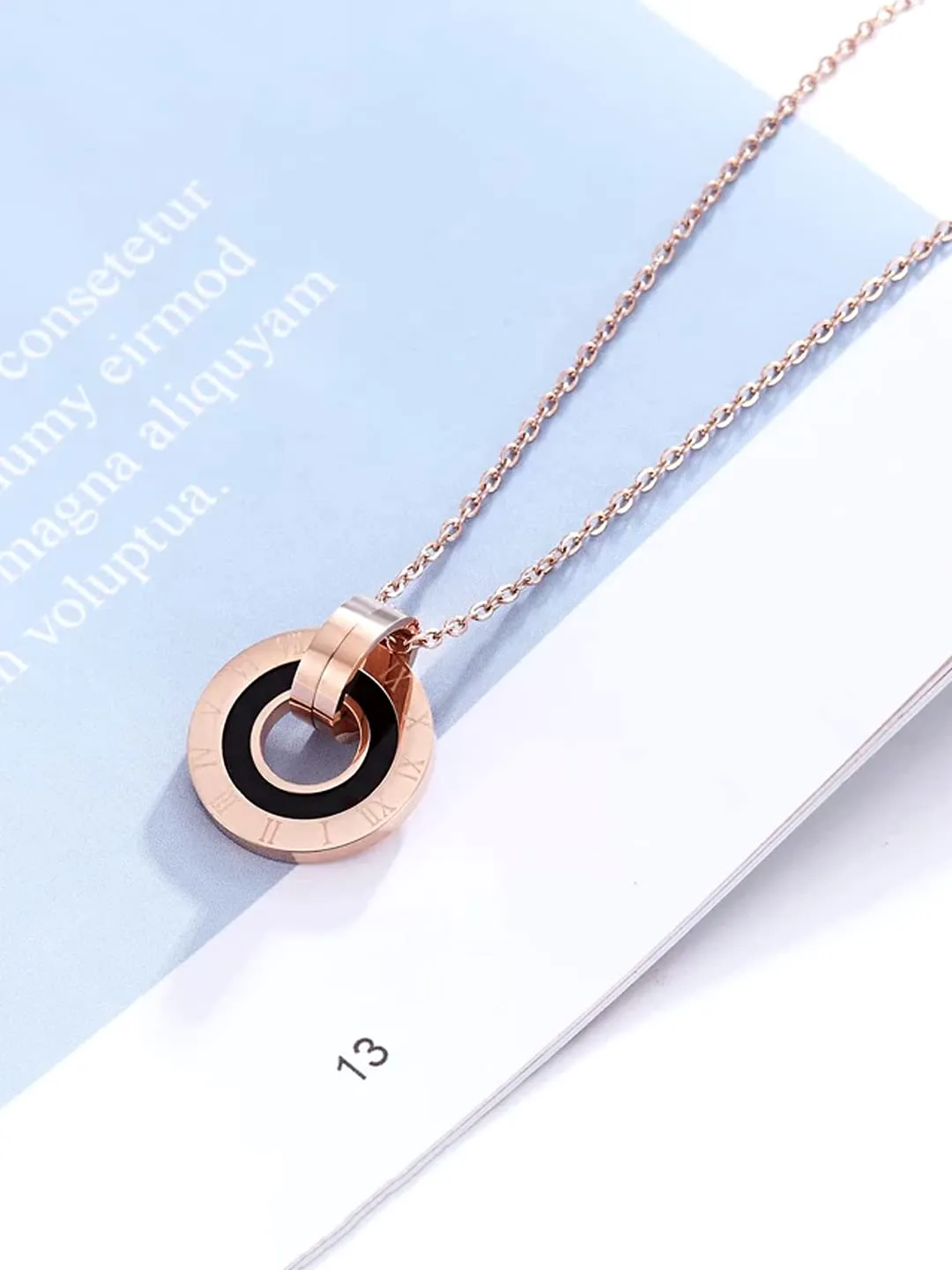 Yellow Chimes Chain Pendant for Women Western Style Rose Gold-Plated Stainless Steel Black Band Ring Pendant Necklace For Women and Girls.